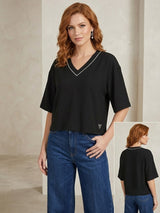 T-shirt scollo a V Guess